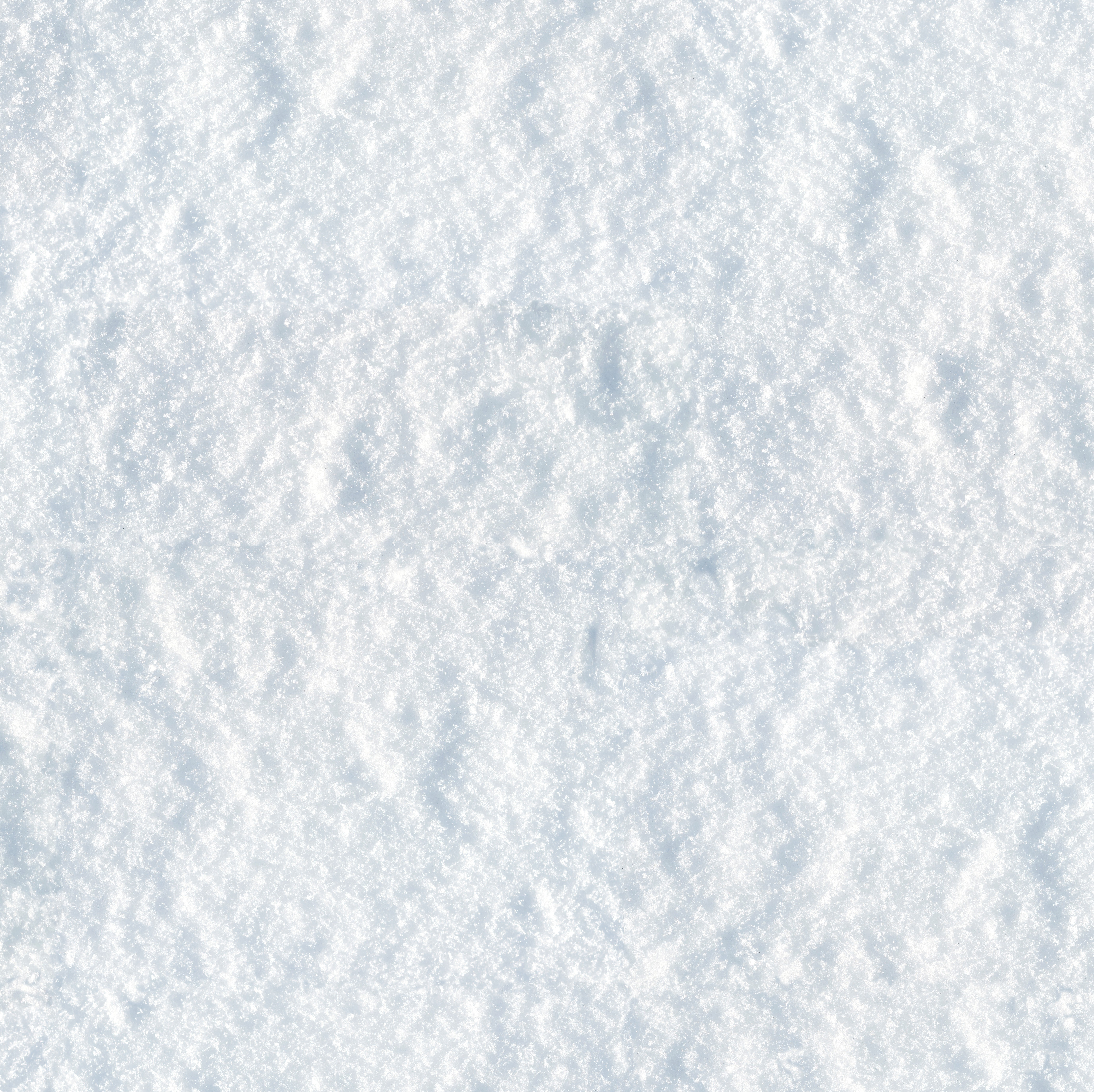 Weiße, körnige Schnee- oder Eisoberfläche in Nahaufnahme als winterlicher Hintergrund für Produktpräsentationen